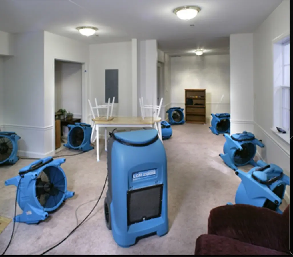 Air movers and dehumidifier setup for Water Damage Restoration in Blackhawk